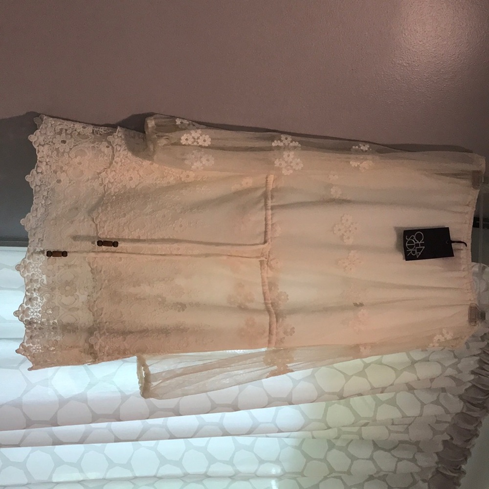 Off shoulder dress brand new w tags .